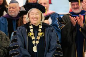 President Ellen Granberg in presidential regalia and wearing the chain of office